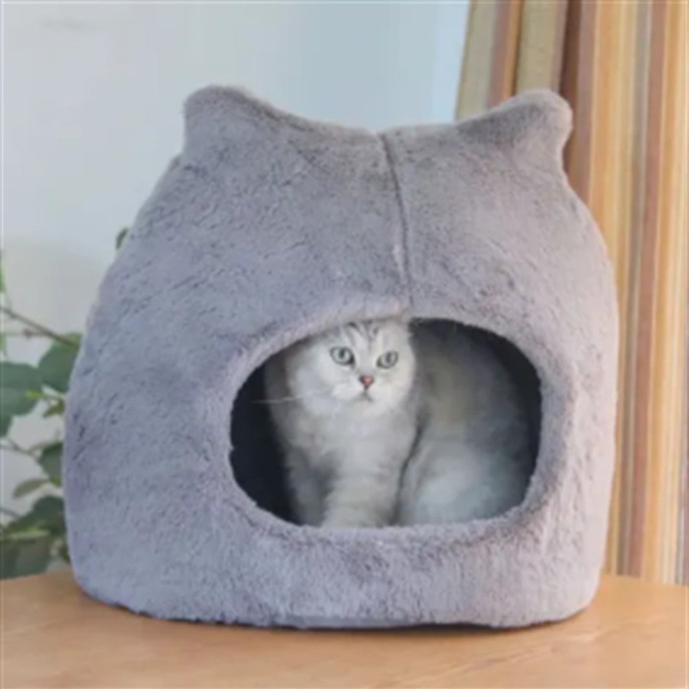 Cozy Cave cat ear hideaway bed in gray with a cat inside